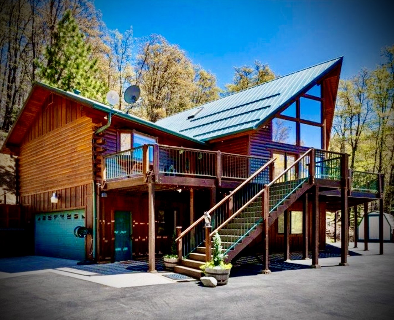 Front view of the sanctuary cabin with stairs and deck